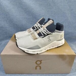 On Running Women's Cream and Black Sneakers